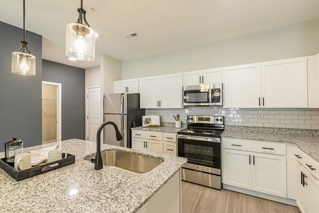 Granite countertops with stainless steel appliances