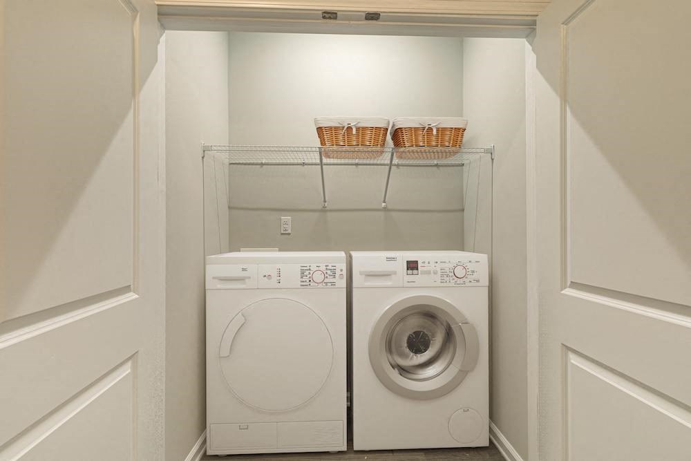 Laundry room with in-unit washer and dryer