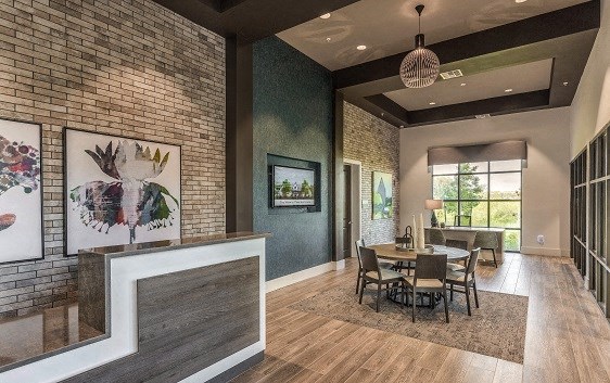 a dining room with a table and a fireplace