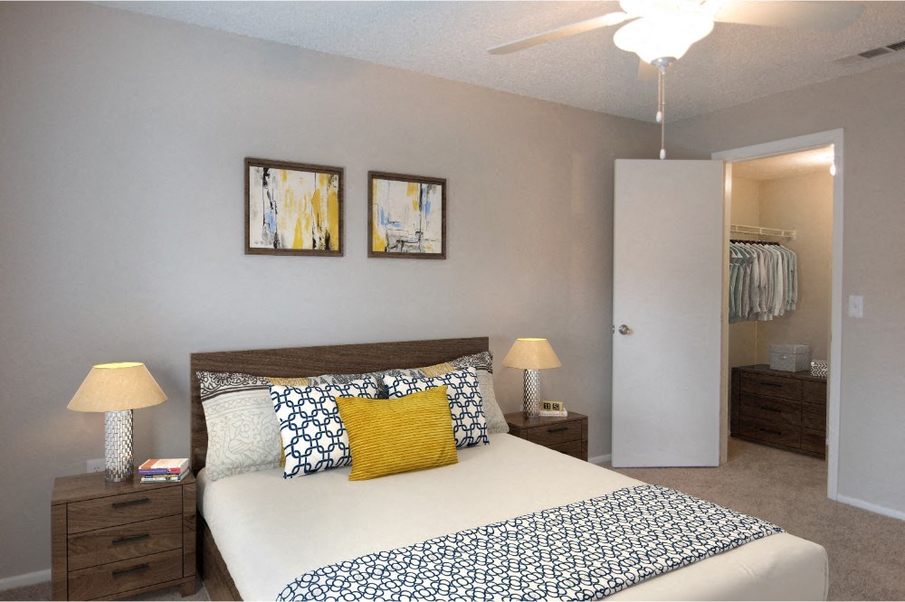 a bedroom with a bed and a closet