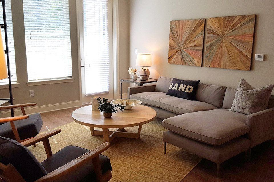 a living room with a couch and a table