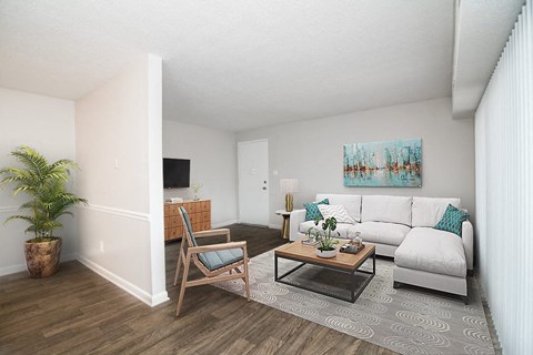 a living room with a couch and a table