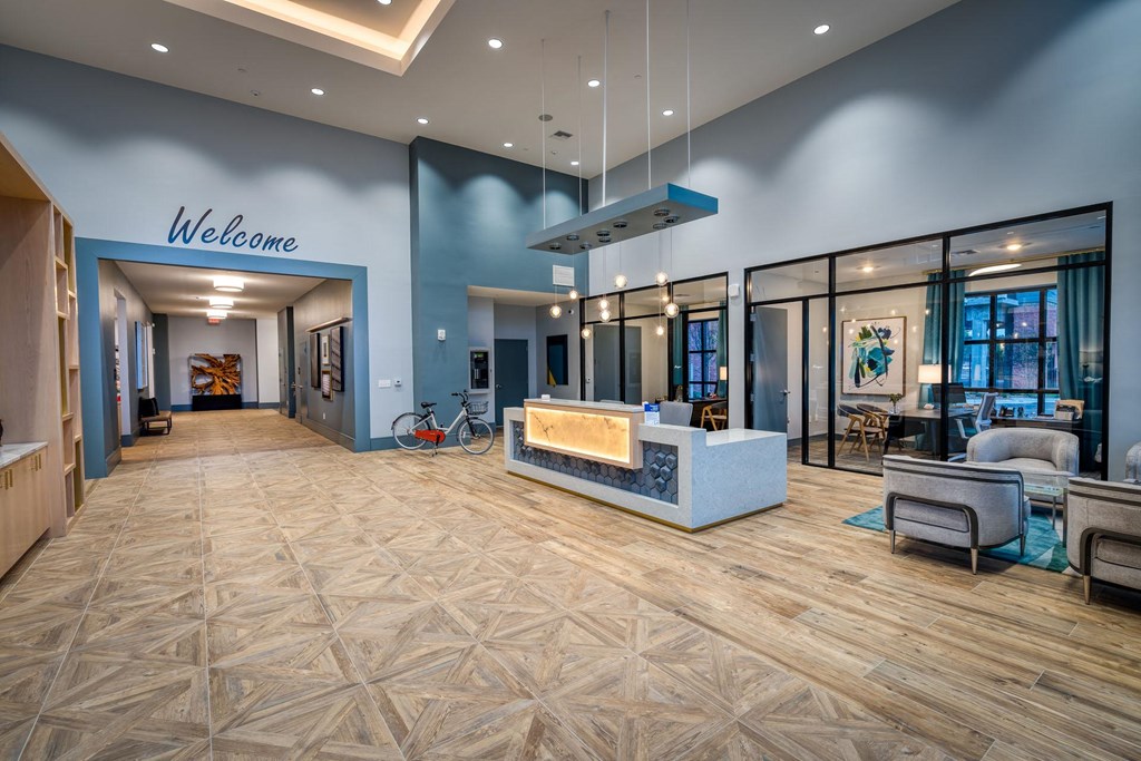 a lobby with blue walls and a reception desk