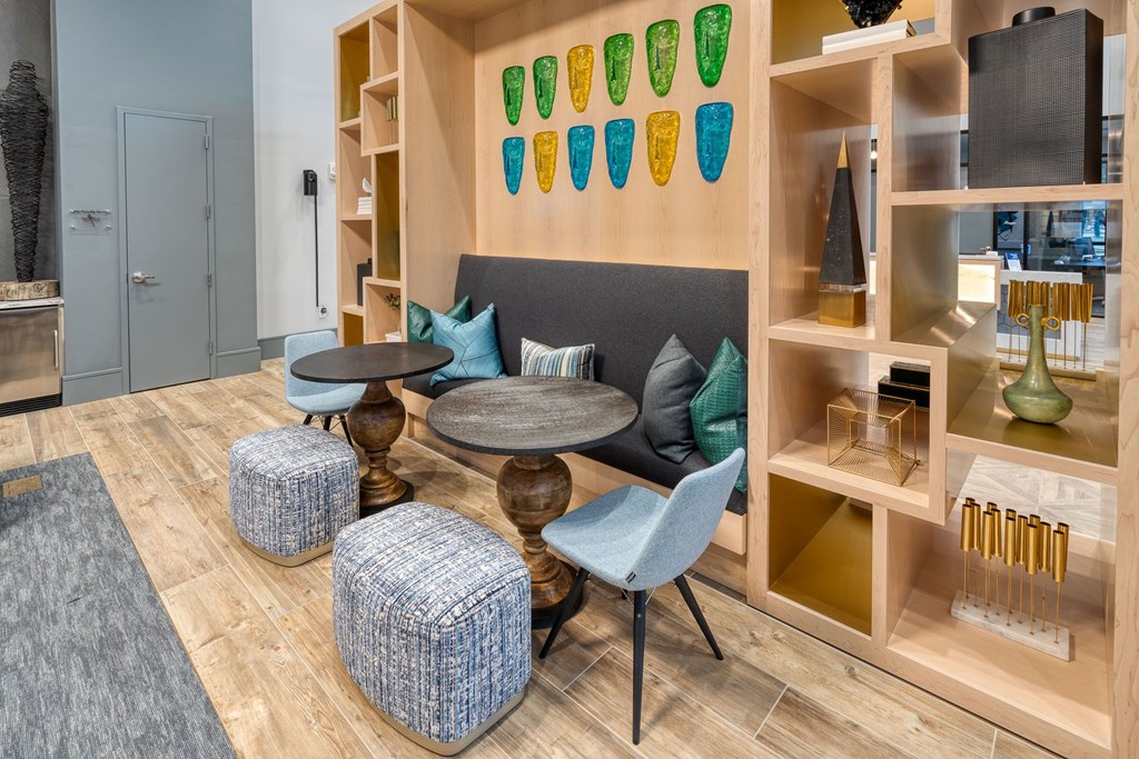 a living room with a couch and tables