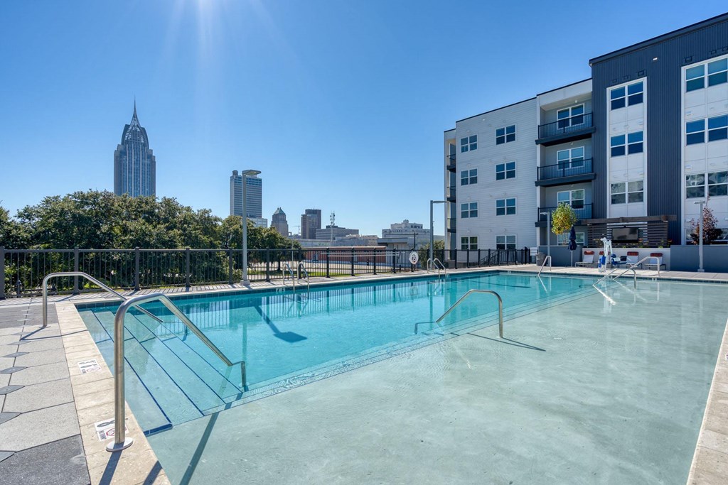 our apartments have a large pool with a view of the city
