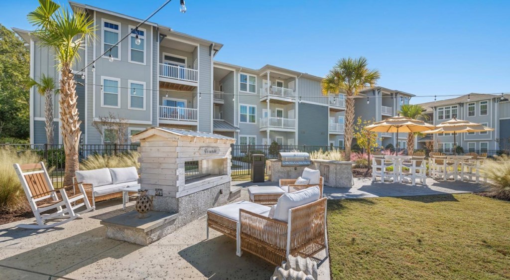 A sunny day at the outdoor seating area of a residential building.