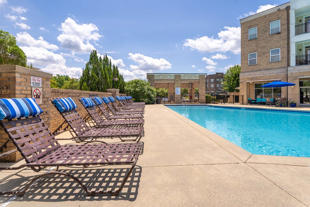 our apartments offer a swimming pool with chaise lounge chairs