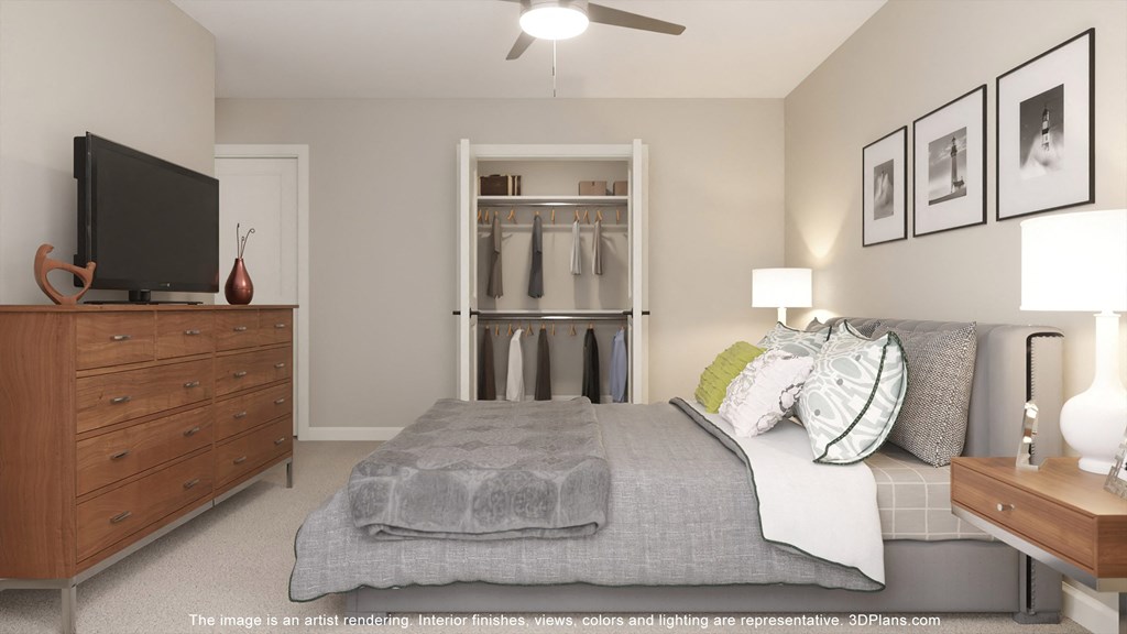 a bedroom with a bed and a dresser and a closet