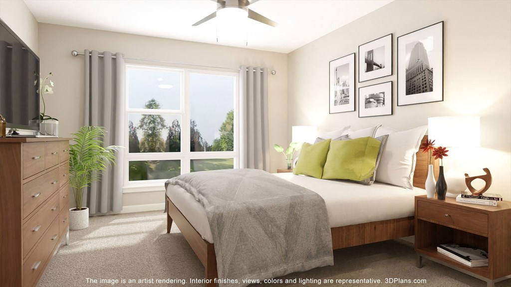 an image of a bedroom with a bed and a window