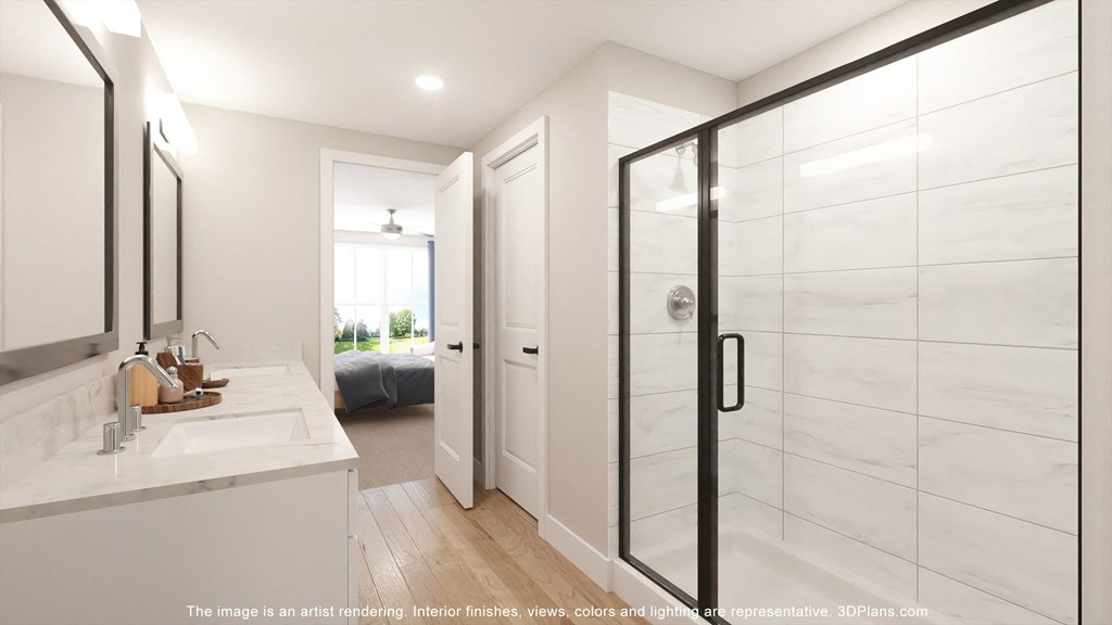an image of a bathroom with a shower and a sink