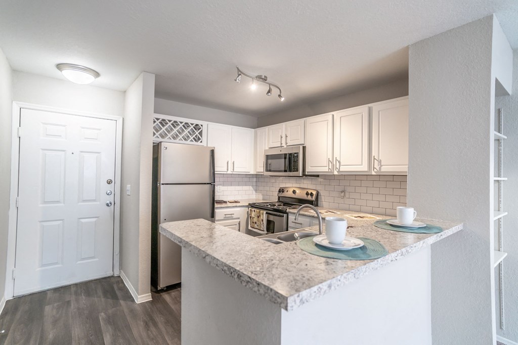 Kitchen at Mission Club Apartments in Orlando, FL