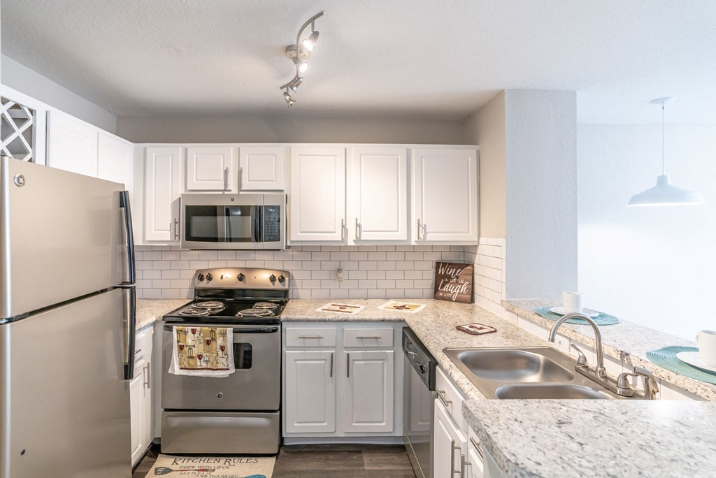 Kitchen at Mission Club Apartments in Orlando, FL