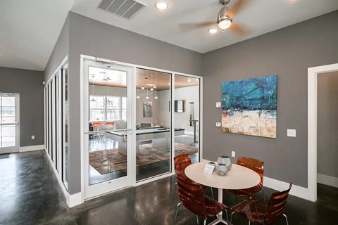 Clubhouse seating with chairs and table.