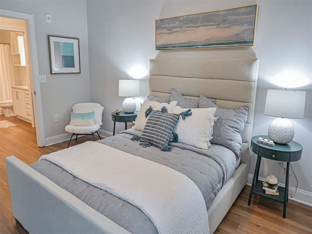 a bedroom with a bed and pillows on it