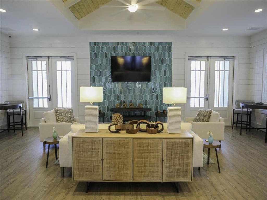 a living room with a couch and a table