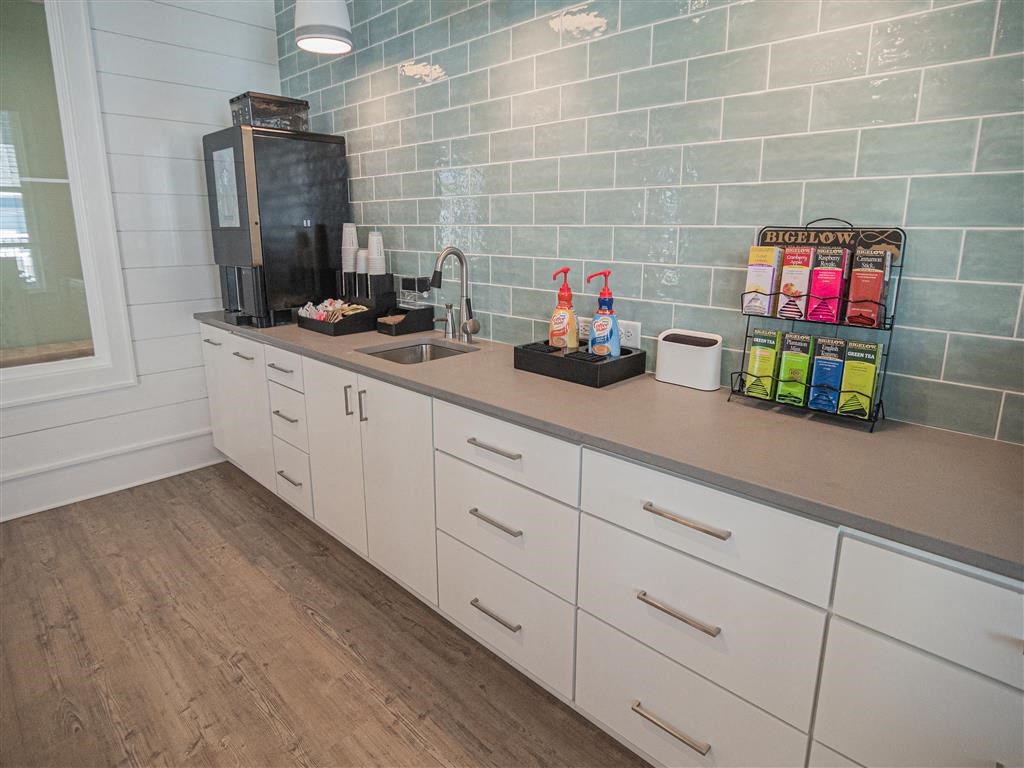 a kitchen with a counter top and a sink