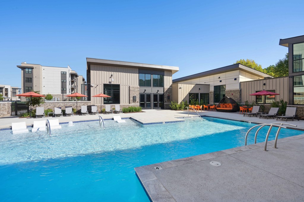 the swimming pool at the falls at rolland park apartments