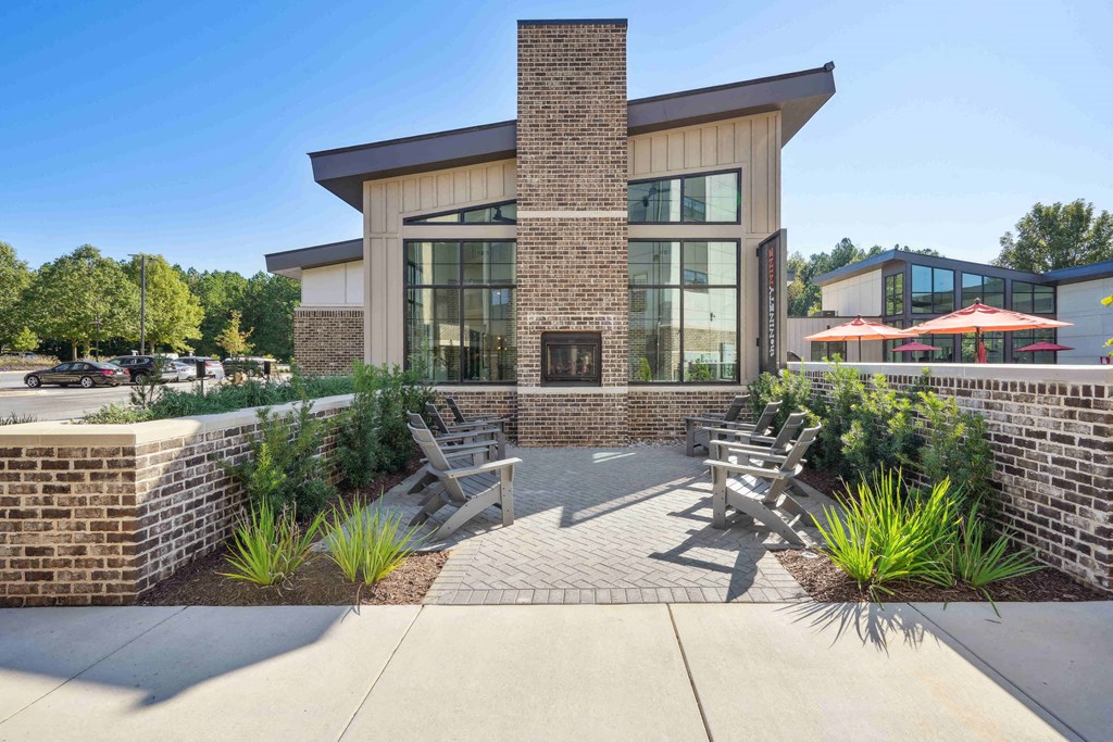 a reflection of a building in a pool of water