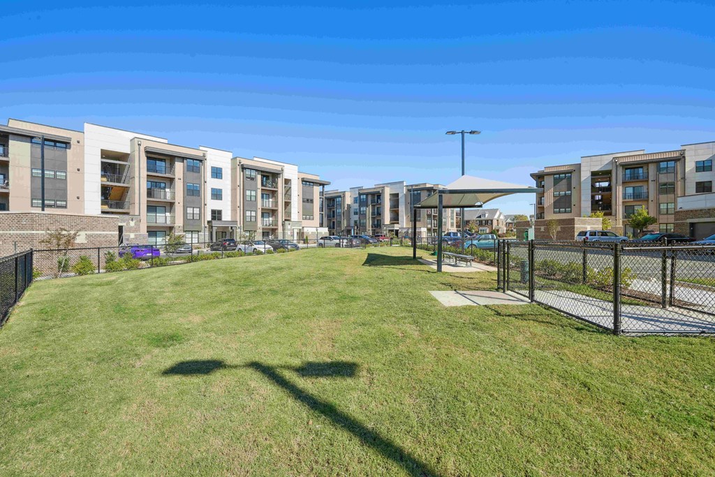the preserve at ballantyne commons dog park with apartment buildings