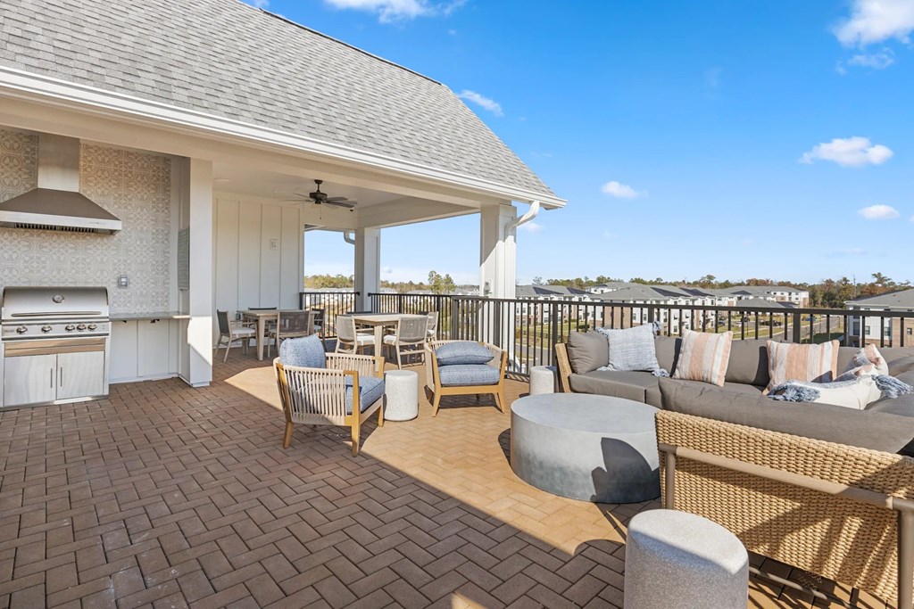 Outdoor Patio with Seating, Table and Chairs.