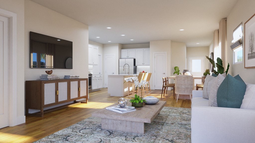 a living room and dining room with a couch and a table