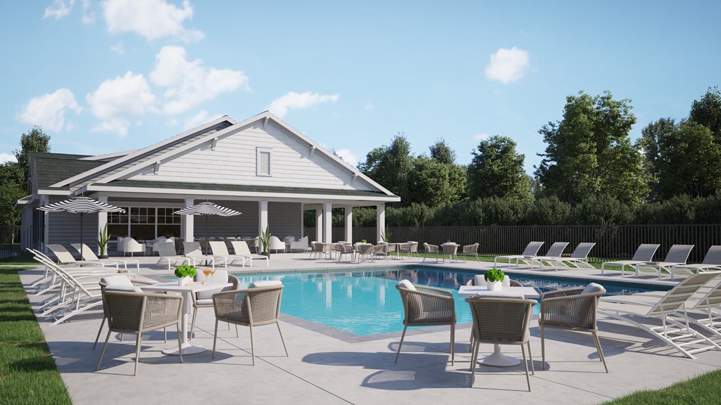 a pool with tables and chairs around it in front of a house