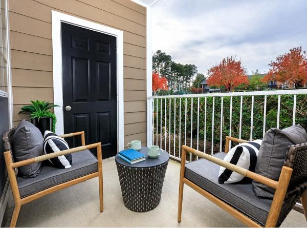The Belmonts private patio or balcony within apartment home