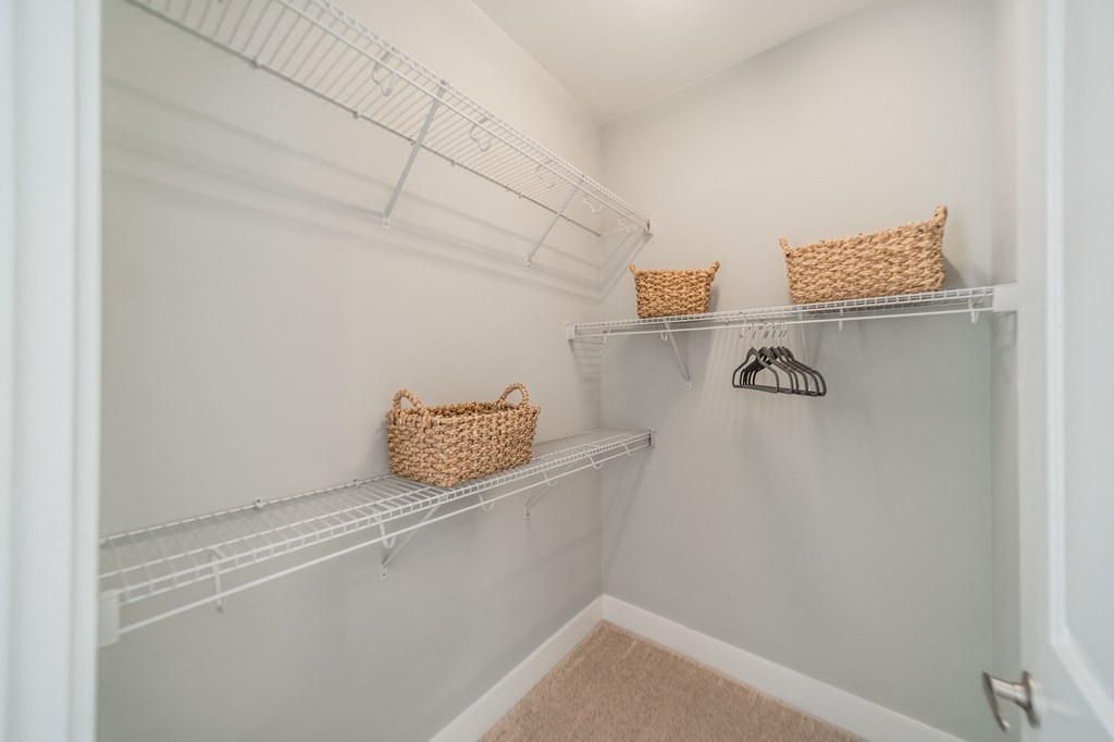 the walk in closet at the preserve at great pond apartments in windsor va