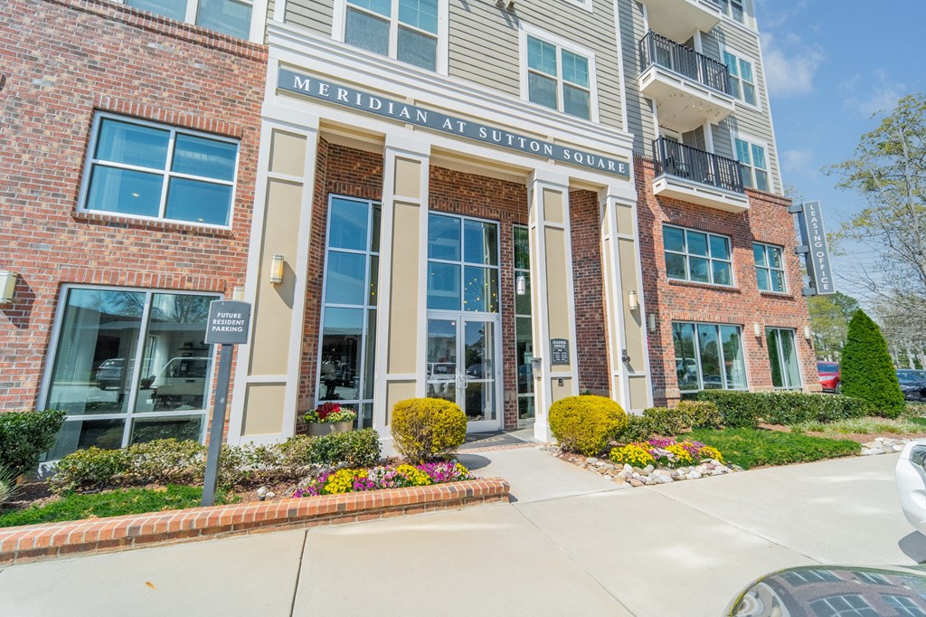 a photo of the front of the meridian at sutton square apartment building
