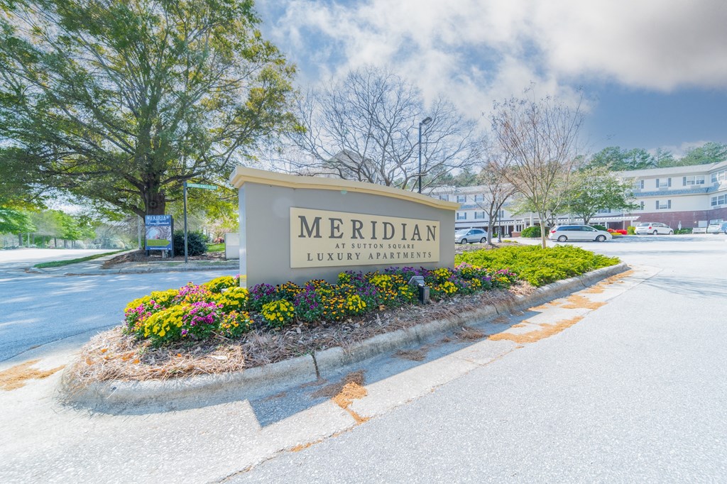 a sign that says meridian in front of a building