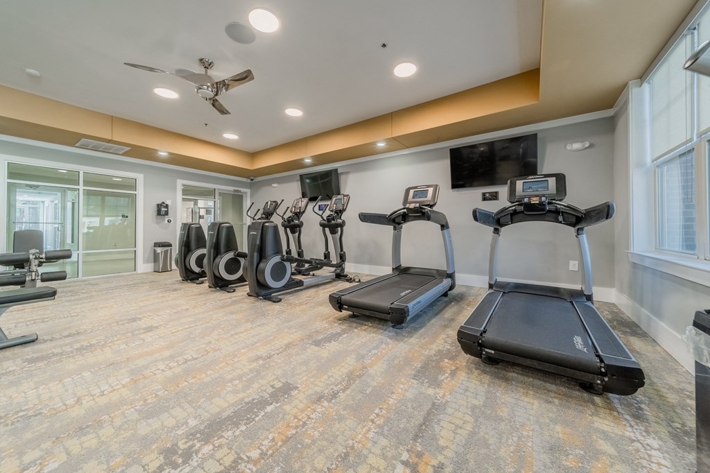 the gym at the whispering winds apartments in pearland, tx