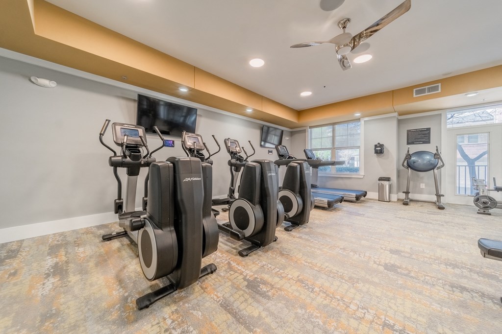 the gym at the whispering winds apartments in pearland, tx
