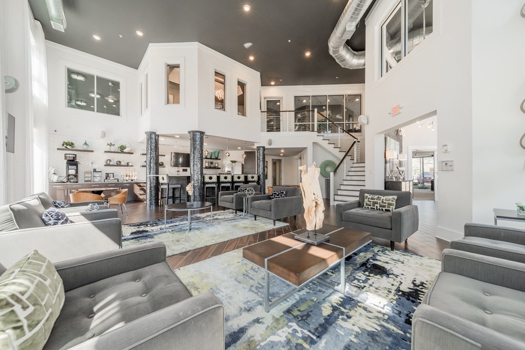 a living room filled with furniture and a fire place