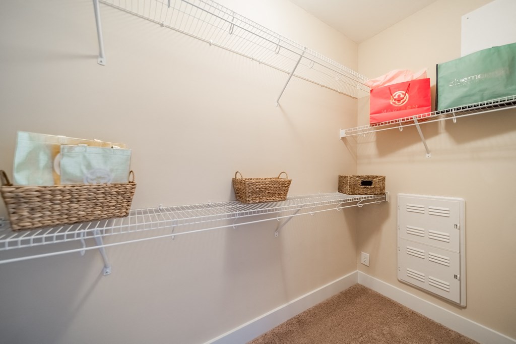 the spacious walk in closets at the enclave at woodbridge apartments in sugar land, tx
