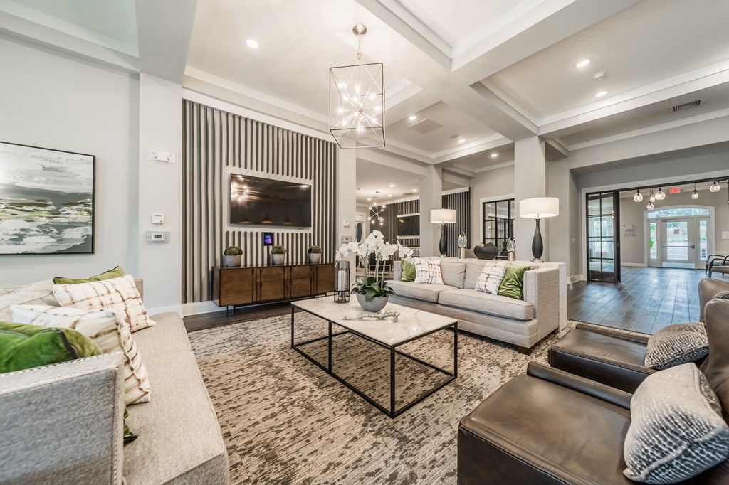 a living room with couches and a coffee table