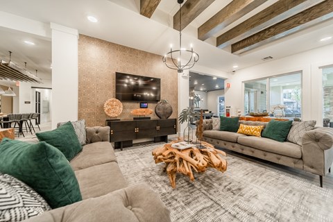 a living room with couches and a coffee table