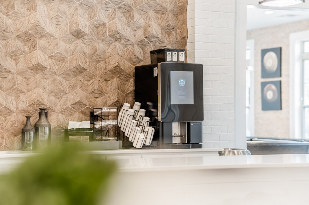 a coffee machine sitting on a counter in a room