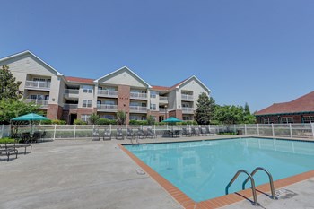 Sparkling swimming pool and spacious sundeck at Autumn Winds in Clarksville, TN Sparkling swimming pool and spacious sundeck at Autumn Winds in Clarksville, TN - Photo Gallery 2