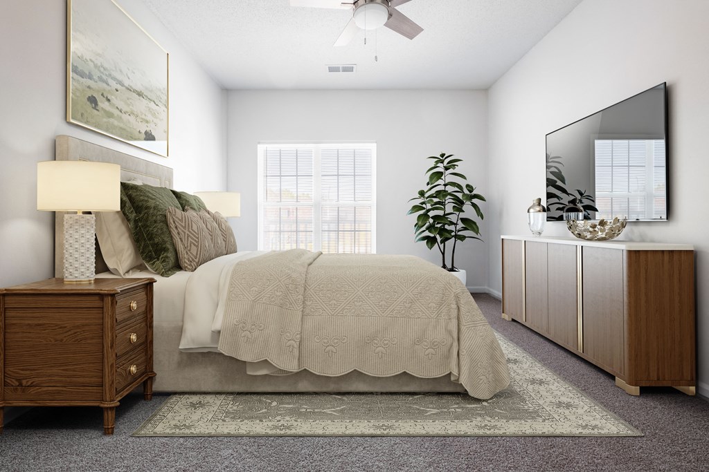 a bedroom with a bed and a dresser