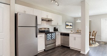 Beautifully designed kitchen inside your apartment home at The Reserves of Melbourne in Melbourne, FL - Photo Gallery 20