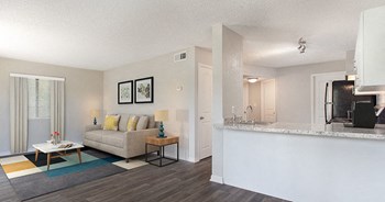 Spacious living room inside your apartment home at The Reserves of Melbourne in Melbourne, FL - Photo Gallery 18
