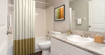 Spacious bathroom inside your apartment home at The Reserves of Melbourne in Melbourne, FL - Photo Gallery 24