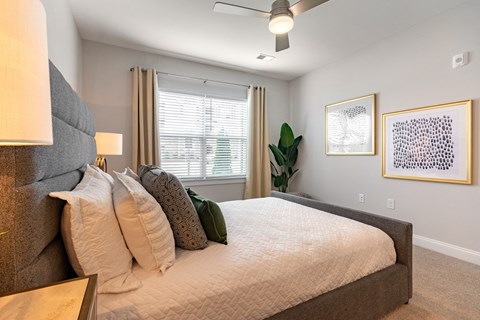 the preserve at ballantyne commons bedroom with large bed and window