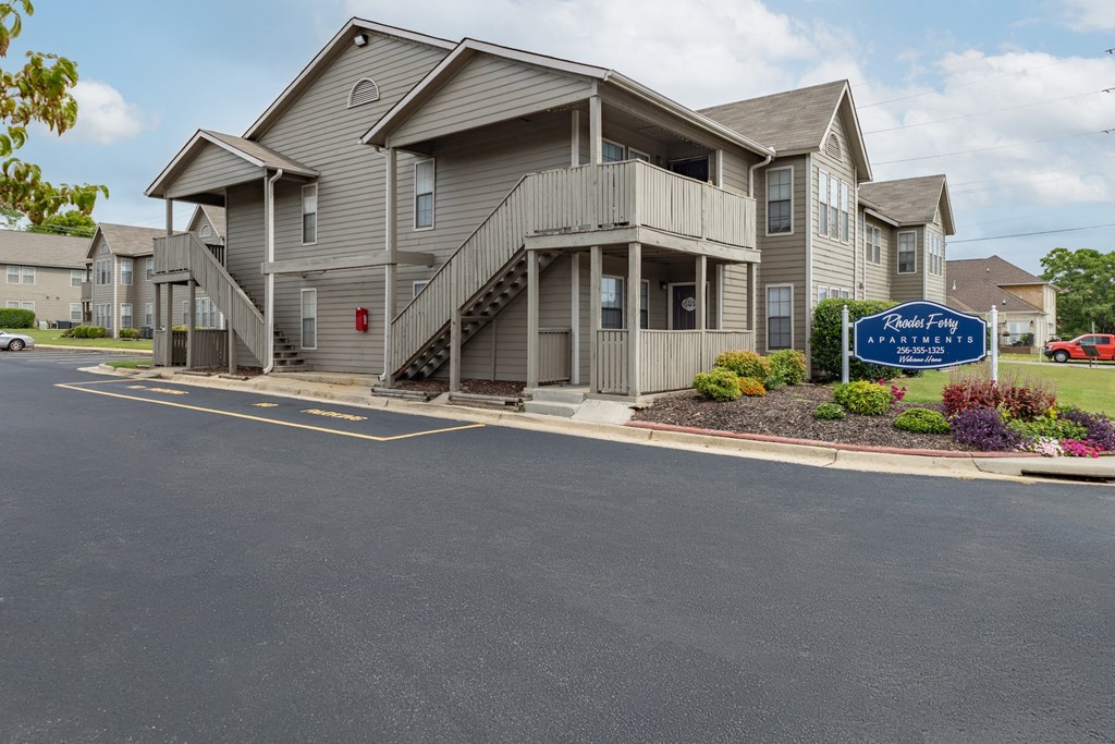 our apartments are located on the corner of a parking lot