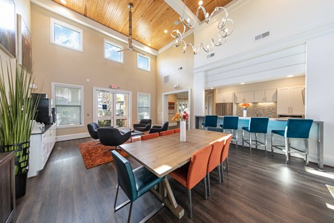 Amenities a dining room with a wooden table and chairs