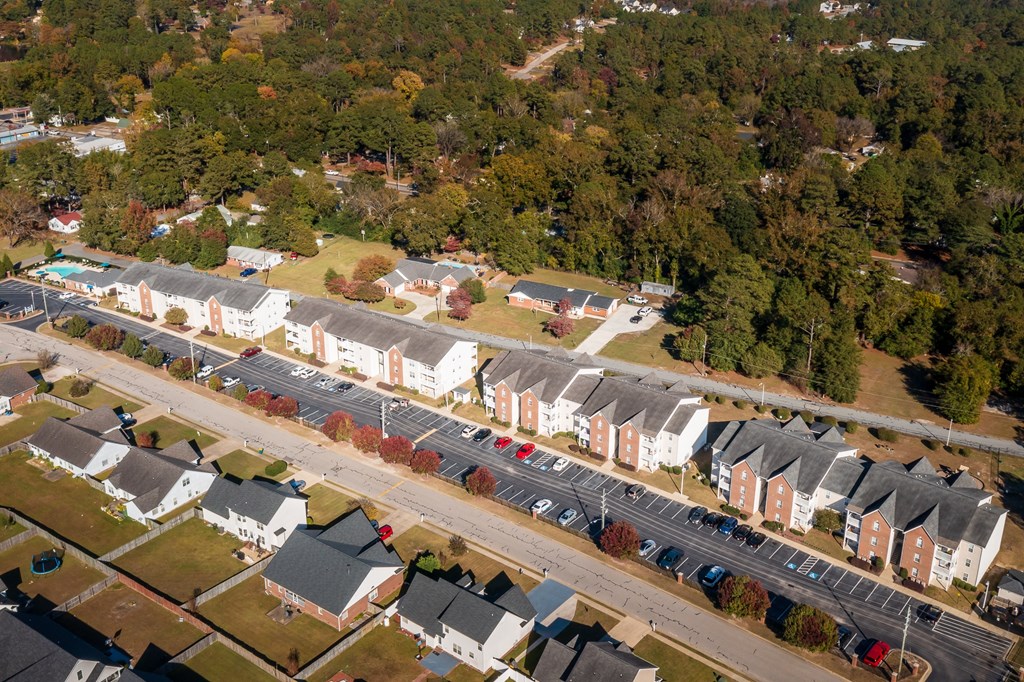 an aerial view of a neighborhood of houses in a city