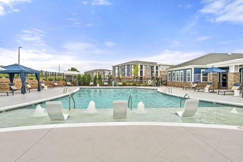 Resort-Style Swimming Pool with Sun Shelf and Expansive Sun Deck