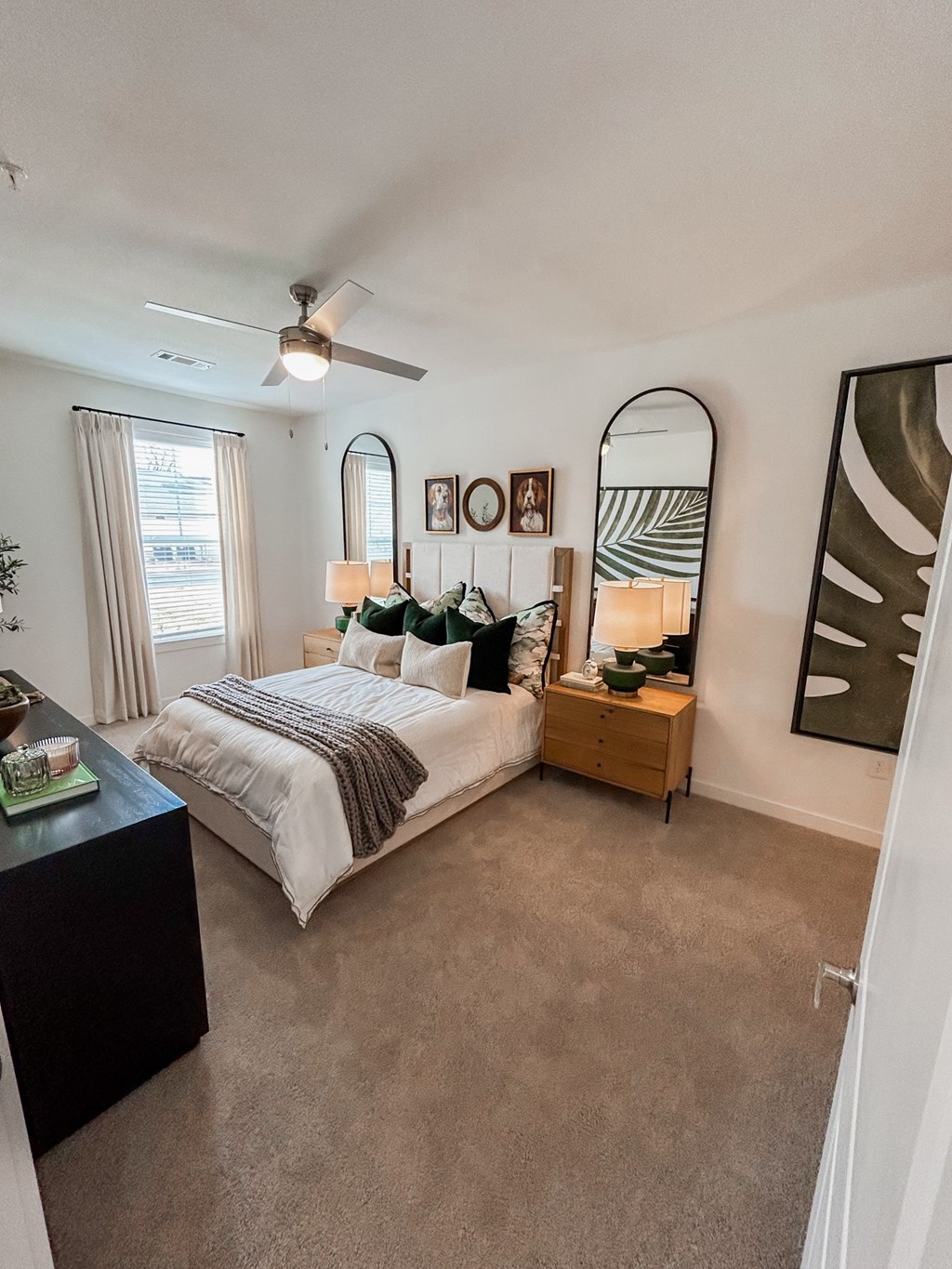 Master bedroom with plush carpet, walk-in closet, and 9-foot ceilings