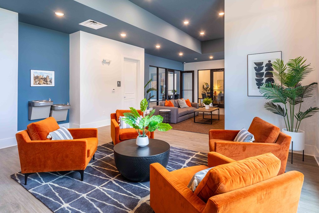 a living room with couches and a coffee table