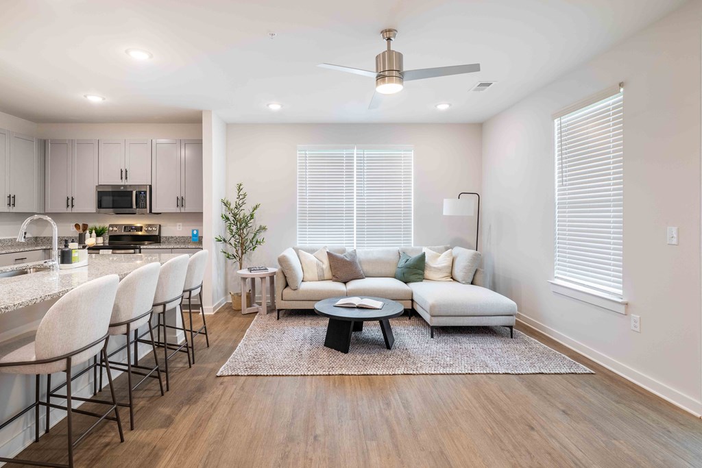 a living room with a couch and a table